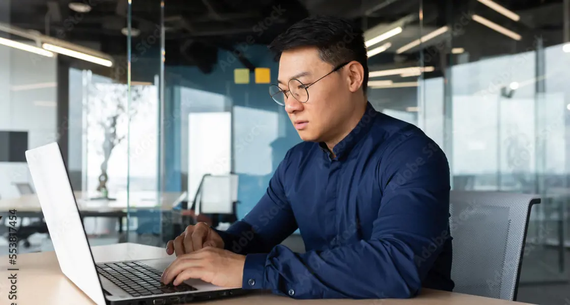 Person working at laptop