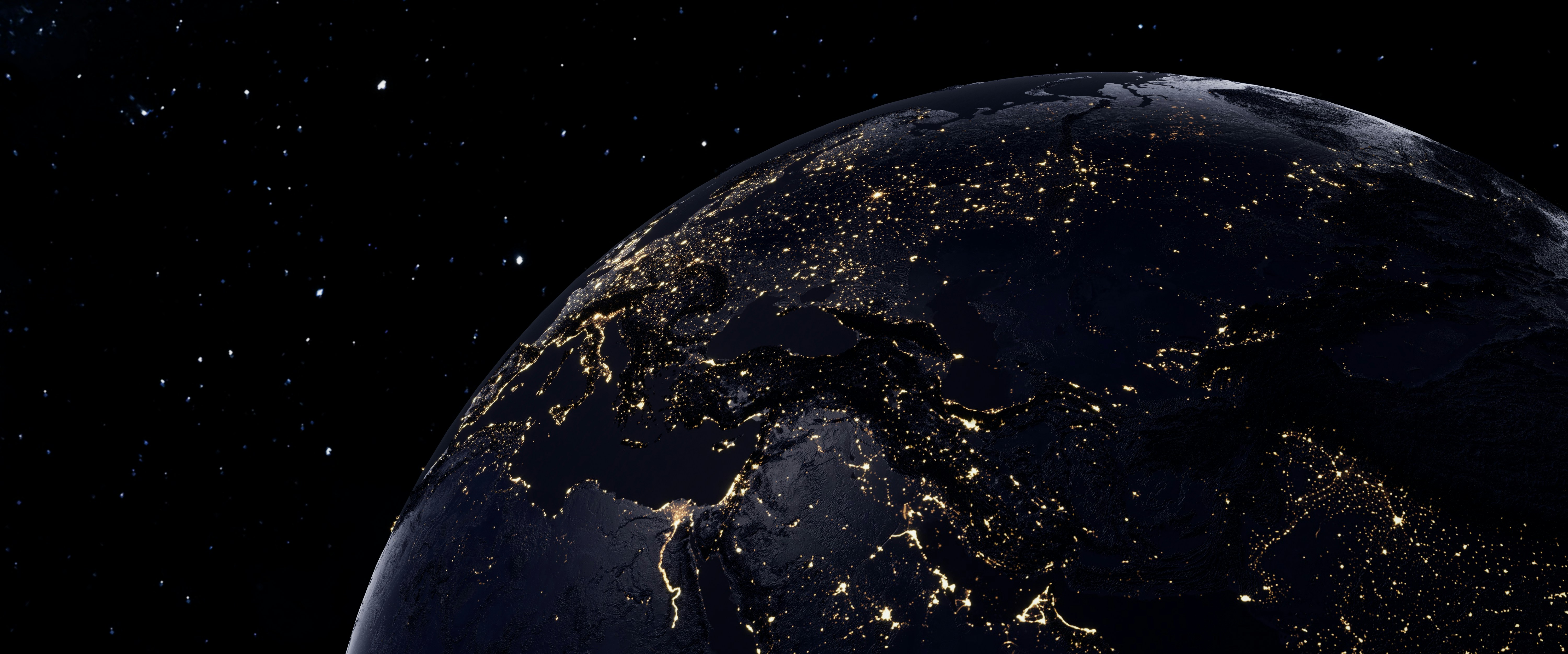 Earth from space at night, with lights spanning across Europe