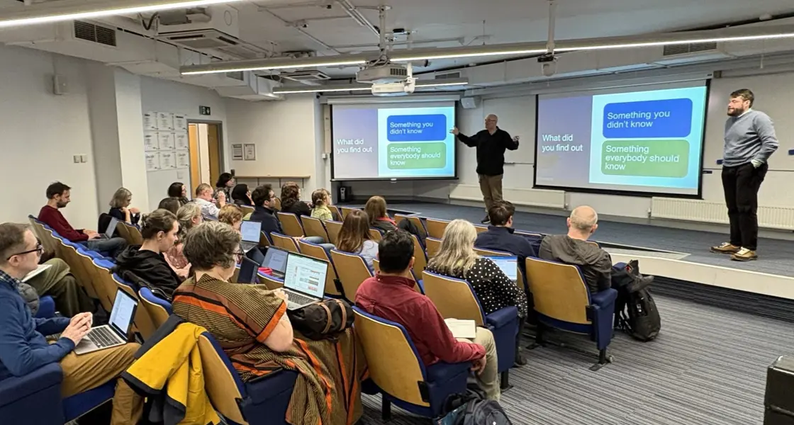 AI Ambassador event with Dominik Lukes presenting on stage