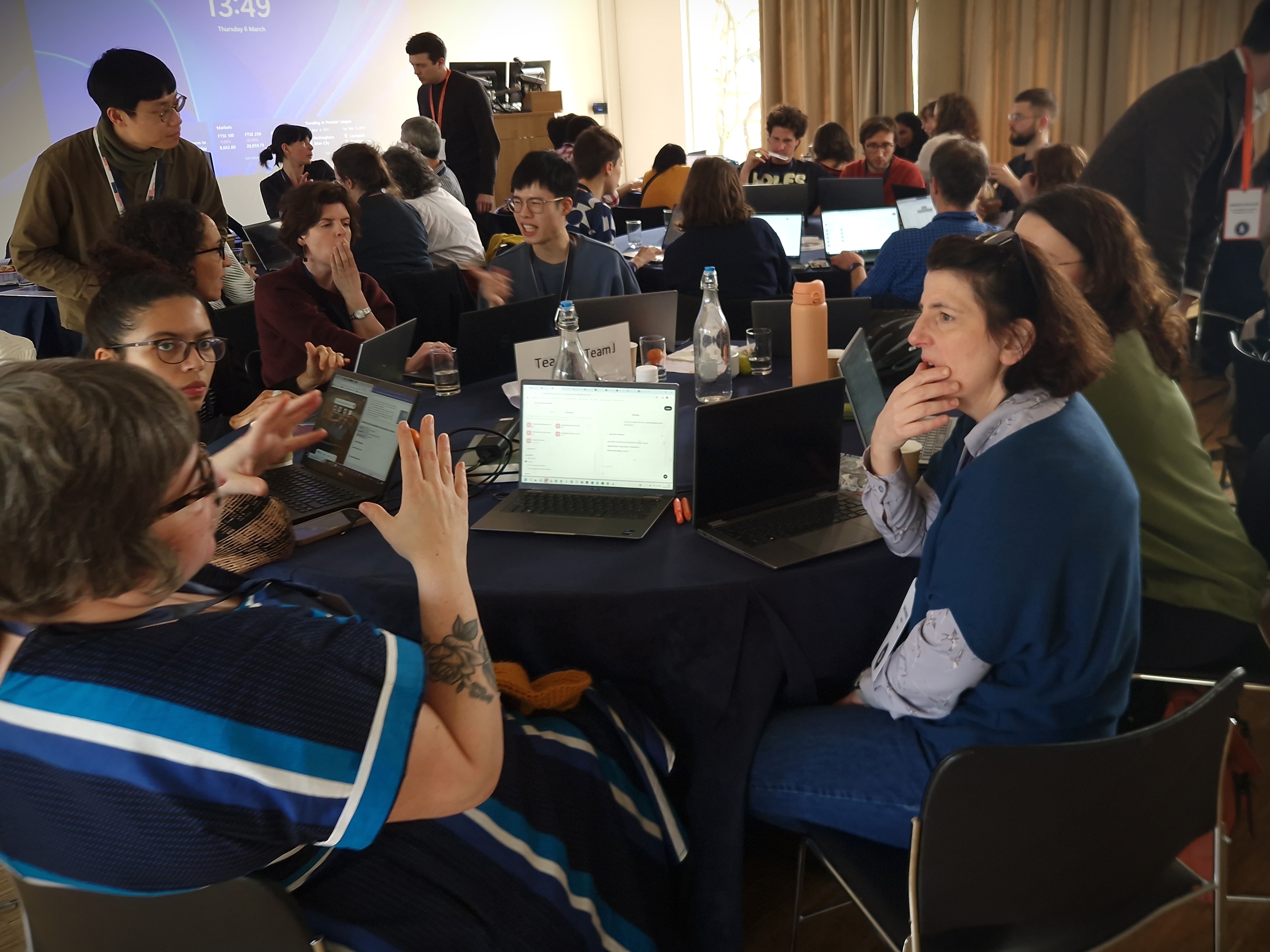 Teams working at Build a Bot event